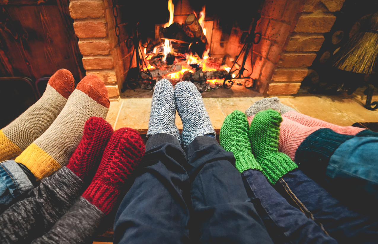 warming your stocking feet by the fire